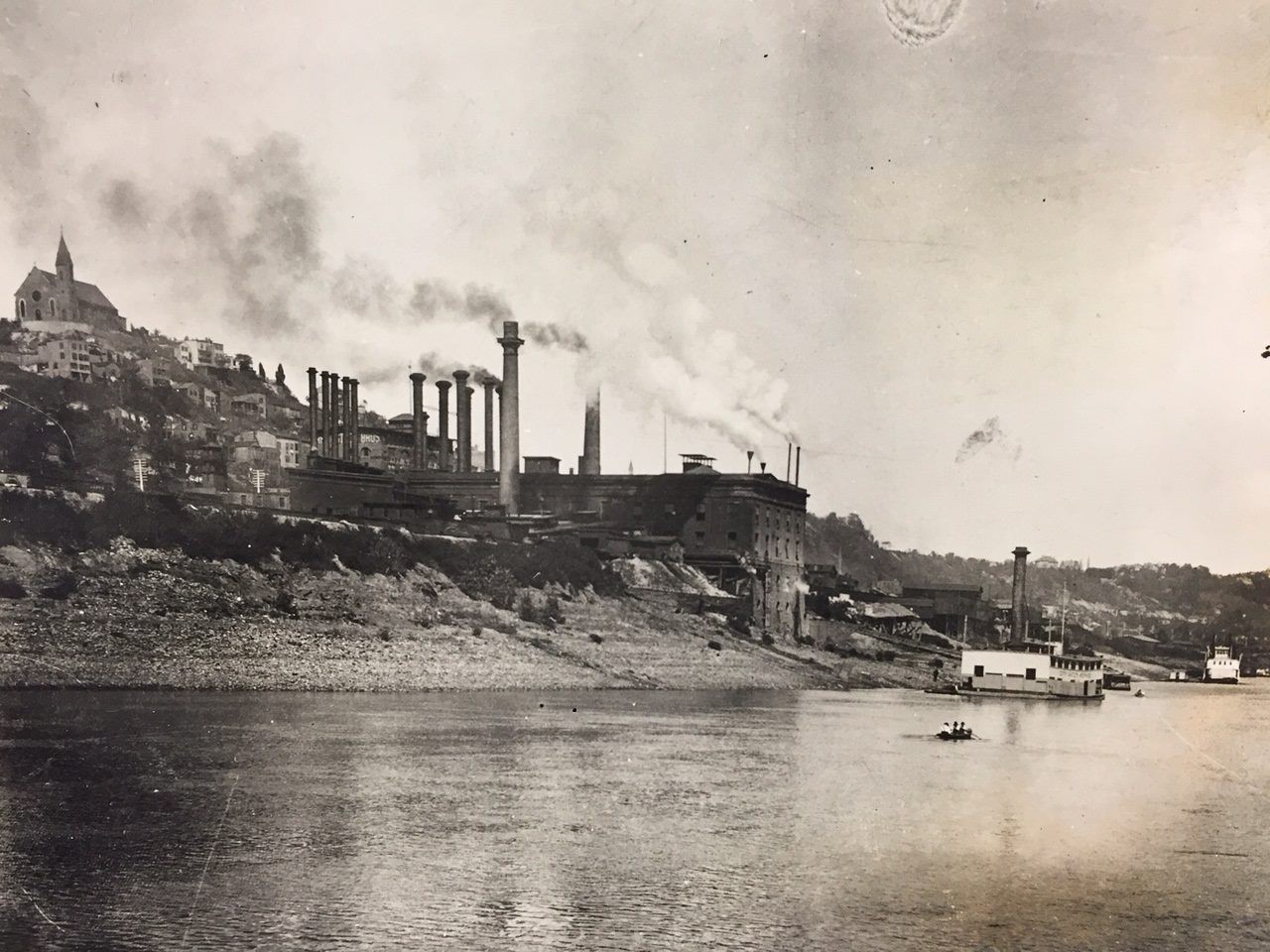 Ohio’s First Publicly Owned Water System
Where you can find the marker: At Sawyer Point (705 E. Pete Rose Way, Downtown), along the riverfront and near the tennis and pickleball courts.
The history: Starting in 1821, Cincinnati’s water supply came from a privately owned company. But in 1839, the city purchased the company following a vote from Cincinnati residents and authorization from the Ohio State Legislature. On June 25, 1839, Greater Cincinnati Water Works became the first publicly owned water system in the state. At the site of the marker in what’s now Sawyer Point, Water Works used two steam pumps, three-and-a-half miles of iron piping and 19 miles of wooden piping to provide the city with a million gallons of water every day. Front Street Pumping Station, replacing the earliest facilities, opened on the same site in 1865 and operated there until 1907. The ruins of the facilities can still be seen at Sawyer Point.