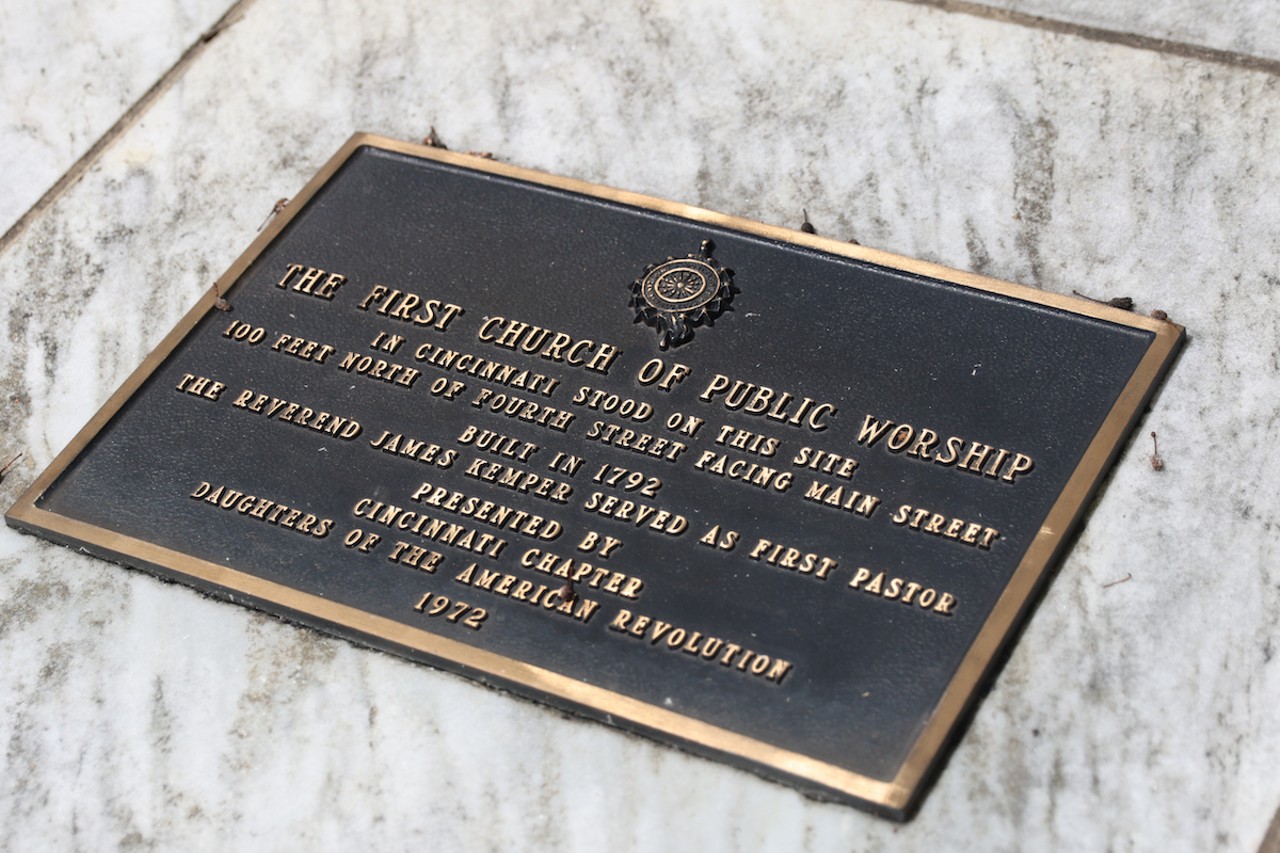 Cincinnati’s First Place of Worship
Where you can find the marker: Near 150 E. Fourth St., Downtown.
The history: While the Federal Reserve Bank building now sits here, this site at the corner of Fourth and Main streets was formerly home to the first place of public worship in Cincinnati. The wood-frame church was erected in 1792 and was called the Cincinnati Presbyterian Church. Rev. James Kemper was installed as its first minister, making him the first minister ordained in Ohio. Jacob Burnet, a judge and early Cincinnati settler described the church as “enclosed with clapboards, but neither lathed, plastered or ceiled. The floor was made of boat-plank, laid loosely on sleepers. The seats were constructed of the same material, supported by blocks of wood. They were, of course, without backs; and here our forefather pioneers worshiped, with their trusty rifles between their knees."