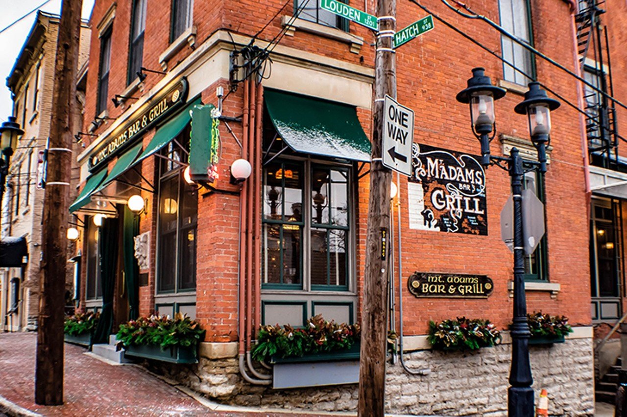 Mt. Adams Bar & Grill
938 Hatch St., Mt. Adams
Opened during Prohibition and believed to have ties to infamous bootlegger George Remus, Mt. Adams Bar & Grill looks like you’re stepping back into a charming bar of the past with its vintage wooden bar, stained-glass windows, antique lamps and coffered pressed-tin-style ceiling. While the interior takes you back to another era, the menu is all modern, with varied options like hearty burgers, soups and appetizers like the must-try fried jalapeño ravioli.