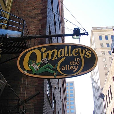 O’Malley’s in the Alley25 W. Ogden Place, DowntownOpened in 1892, O’Malley’s in the Alley bills itself as the second-oldest bar in Cincinnati. The pub offers a straightforward imbibing experience, drink specials and homemade dishes that have stood the test of time, like its beer-battered fish sandwich, fish and chips or wings. You’ll find the entrance in a shady alleyway along Ogden Place, not too far of a walk from Great American Ball Park, making it a must-stop spot before or after a game.