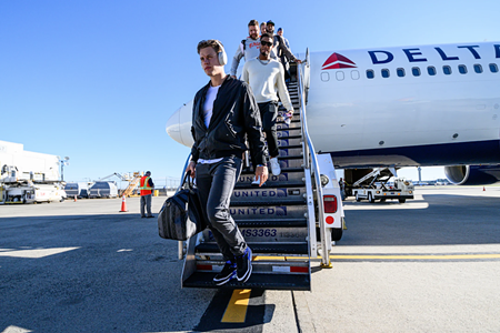 Cincinnati Bengals quarterback Joe Burrow wears a black jacket and denim before the game against the New York Jets on Sept. 25, 2022.