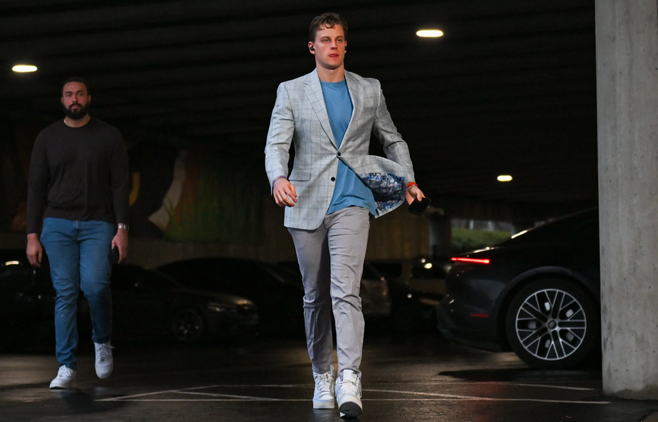 Cincinnati Bengals quarterback Joe Burrow wears a grey plaid jacket before the game against the Buffalo Bills on Jan. 2, 2023.