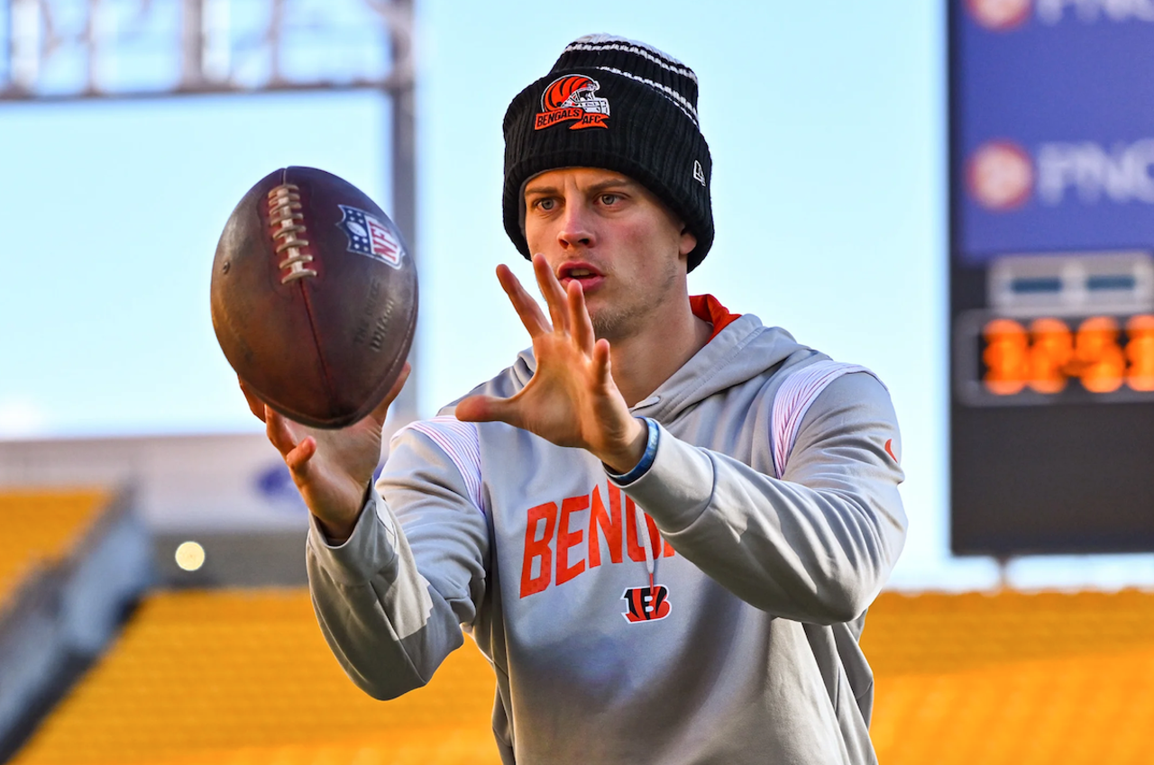 Cincinnati Bengals quarterback Joe Burrow wears a grey Bengals sweatshirt and black beanie before the game against the Pittsburgh Steelers on Nov. 20, 2022.