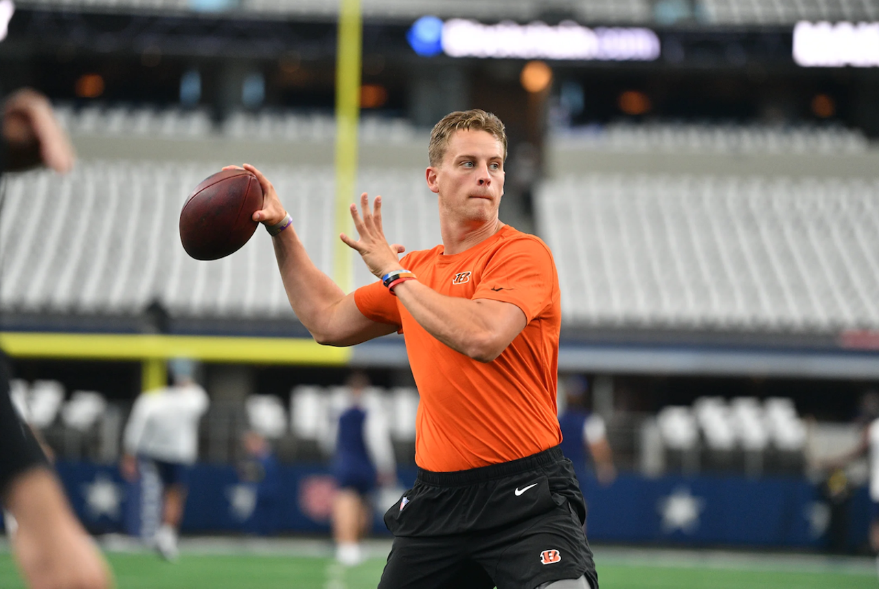 Cincinnati Bengals quarterback Joe Burrow wears an orange Bengals workout shirt before the game against the Dallas Cowboys on Sept. 18, 2022.