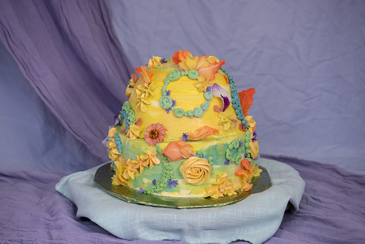 Vanilla cake with lemon-strawberry jam, fresh strawberries and vanilla French buttercream, garnished with gladioli, zinnia and bachelor buttons from Bowman's cutting garden