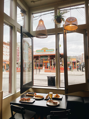 Dining room faces Findlay Market entrance - Photo: Facebook.com/KanjiOTR