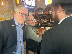 Covington Mayor Joseph Meyer socializing with former Covington City Commissioner Steve Frank and Rabbi Shlomo Litvin at The Hannaford on March 26, 2024. Frank and Litvin have each expressed genocidal and dehumanizing rhetoric toward Palestinians both verbally and over social media. - Photo: Courtesy of Jordan Smart