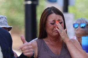 Stacie Morrow-Stickrod attends a press conference about the alleged assault with her family on July 15. - Photo: Lydia Schembre