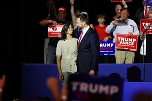 JD Vance and his wife, Usha Vance, during his first solo campaign rally as the Republican vice presidential nominee at Middletown High School on July 22. - Photo: Lydia Schembre