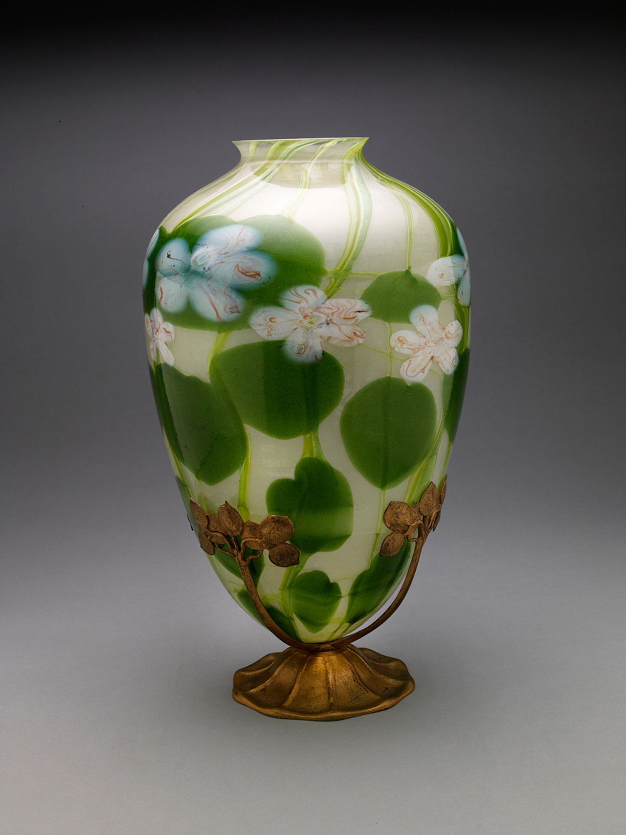 Tiffany Studios, Water Lily Millefiore Vase with Stand, about 1910, blown glass, gilt bronze stand.